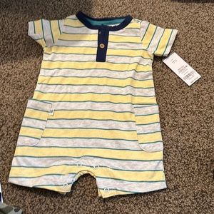 Brand new NWT short sleeve one piece. Carters size 6 months.